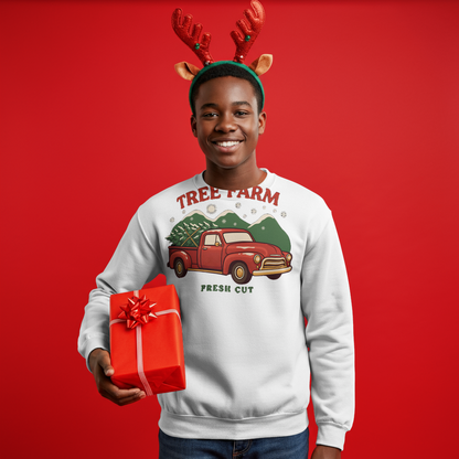 Christmas Tree Farm Sweatshirt worn with reindeer antlers and a gift