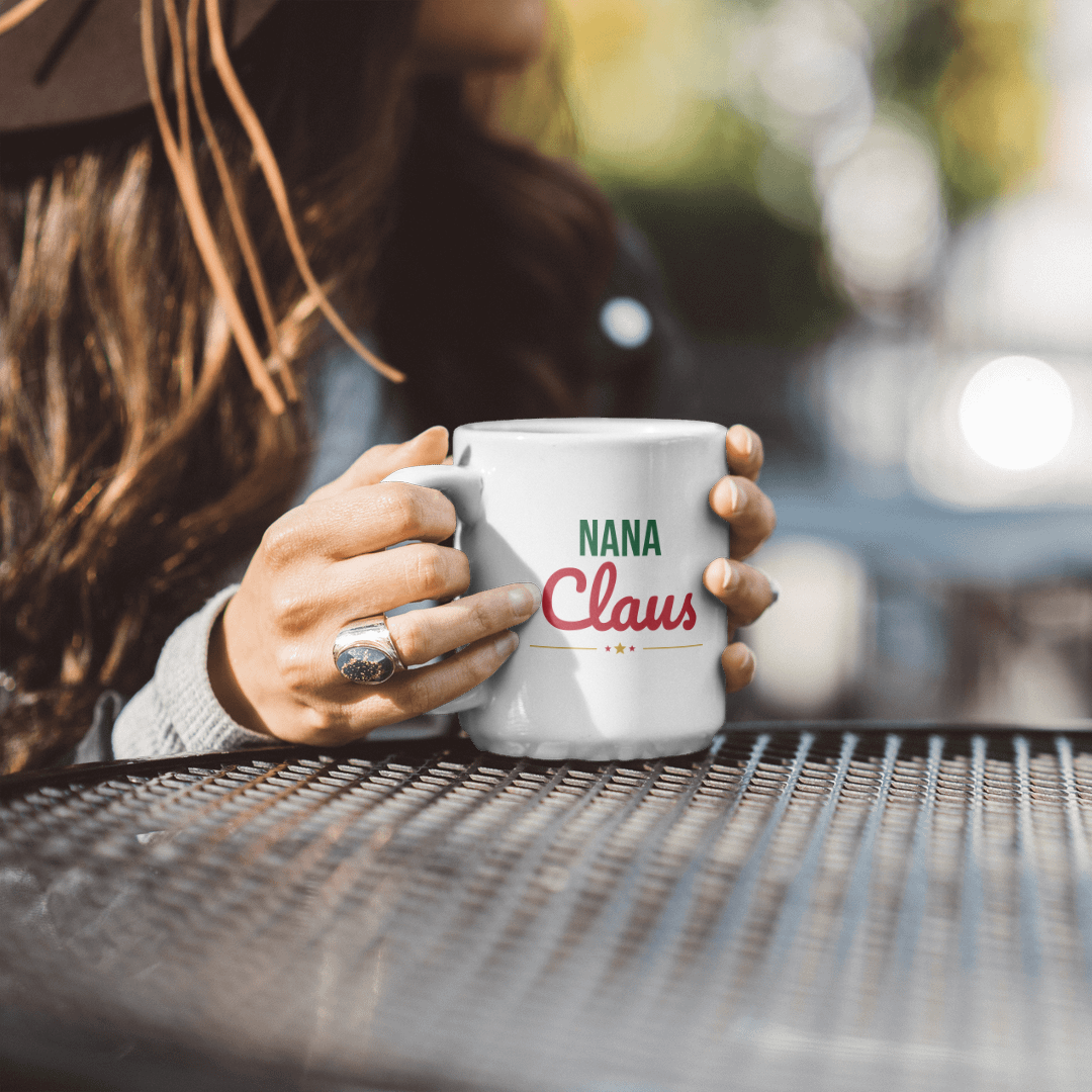 Nana Claus Mug held outdoors