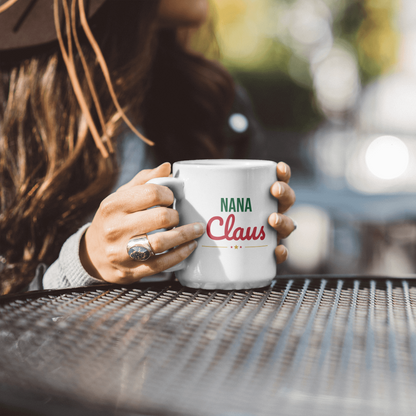 Nana Claus Mug held outdoors