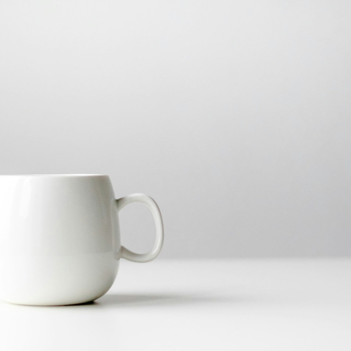 White ceramic mug with coffee